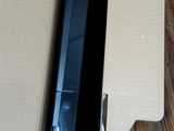 a box with a laptop inside of it on a wooden table