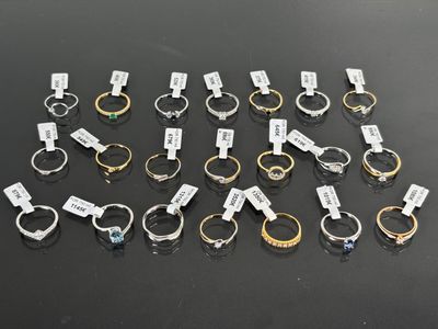 a lot of different types of rings on a table