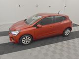 a red car parked in a garage with a checkered floor