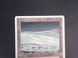 a picture of a card with a picture of a snow covered landscape