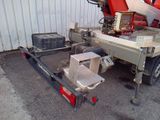 a picture of a trailer with a machine attached to it