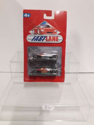a close up of a toy car in a clear box