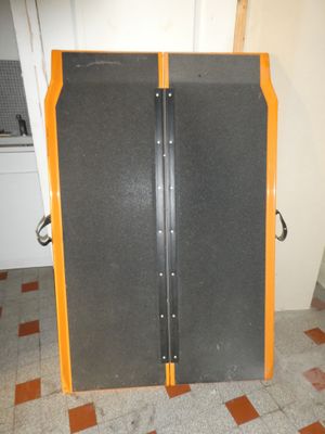 a suitcase that is sitting on the floor in the room