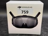 packaging of a pair of goggles sitting on top of a box