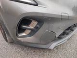 a close up of a car with a denting front bumper