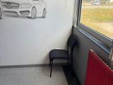 a drawing of a car on the wall next to a radiator