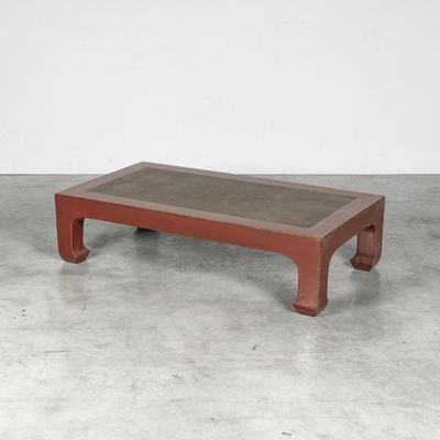 an image of a coffee table with a concrete top in a room