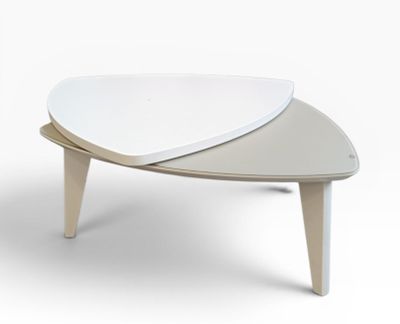 a white table with a wooden base and a white top