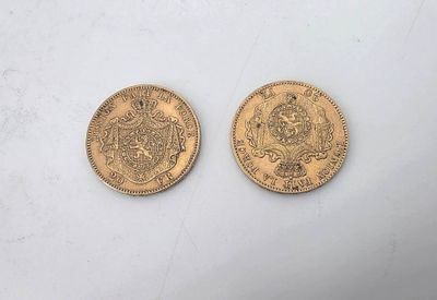 two gold sovereigns, one of which is a sovereign and the other of which is a sovereign
