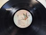 an old vinyl record with a picture of a bird on it