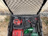 a tool box with tools in it on the ground