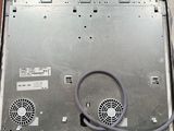 a laptop computer sitting on top of a table