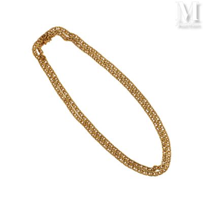 a gold chain bracelet with a clasp on a white background