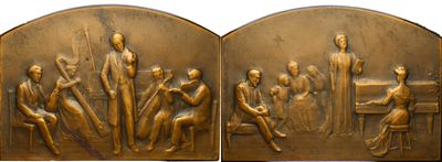 pair of antique bronze bookends depicting a group of people sitting at a table
