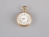 pocket watch with roman numerals on the dial and roman numerals on the face