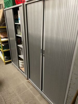 a large metal cabinet in the middle of a room