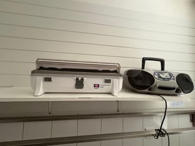 a radio that is sitting on top of a shelf