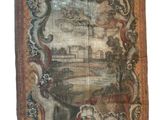 an old tapestry with a picture of a castle on it