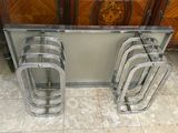 four chairs that are sitting on a tile floor