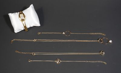 a collection of gold jewellery including bracelets, rings and a ring