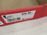 a red box with a barcode on it sitting on a table