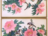 two paintings of birds and flowers on the wall