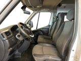 the interior of a van with the driver ' s seat folded down