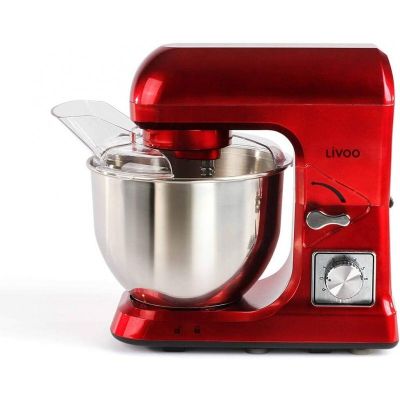 un mixeur rouge posé sur une surface blanche
