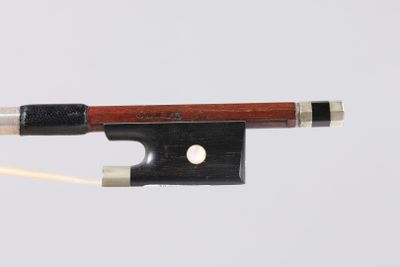 a violin bow that is attached to a string