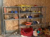 a room with a bunch of hoses and a fire hydrant in it