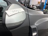 a sticker on the side of a car with a sticker on it
