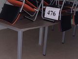a lot of chairs that are sitting in a room