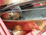 a pile of old pots and pans sitting on a table