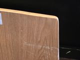 a laptop computer sitting on top of a wooden desk
