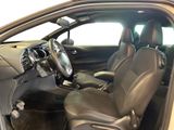 the interior of a car with the door open and the driver ' s seat up
