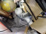 a pile of clutter and other items that are on the floor