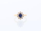 une bague à grappes de saphirs et de diamants