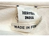 a close up of a label on a white shirt that says hermes paris made in france