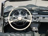 steering wheel and dashboard of a classic sports car with leather seats