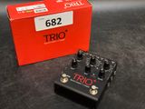 a close up of a box of three different pedals on a table