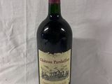 a bottle of wine that is sitting on a table