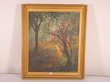 an oil painting of a tree with pink flowers in a gold frame