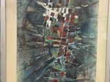 framed painting of a painting of a cityscape in a white frame