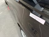 a sticker on the door of a car that says october
