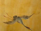 a painting on the wall of a building with a bird flying in the sky