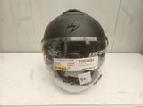 the helmet is black and has a sticker on it
