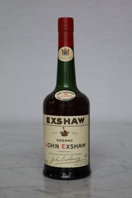 a bottle of whisky sitting on a counter top