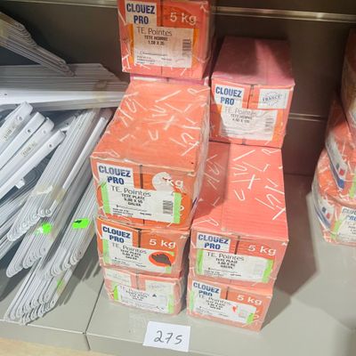 many boxes of toilet paper on the shelf in the store