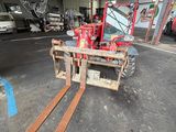 a forklift that is parked in a garage