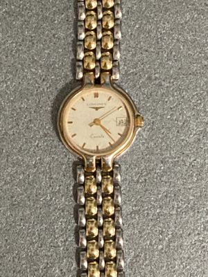 a close up of a wrist watch on a table